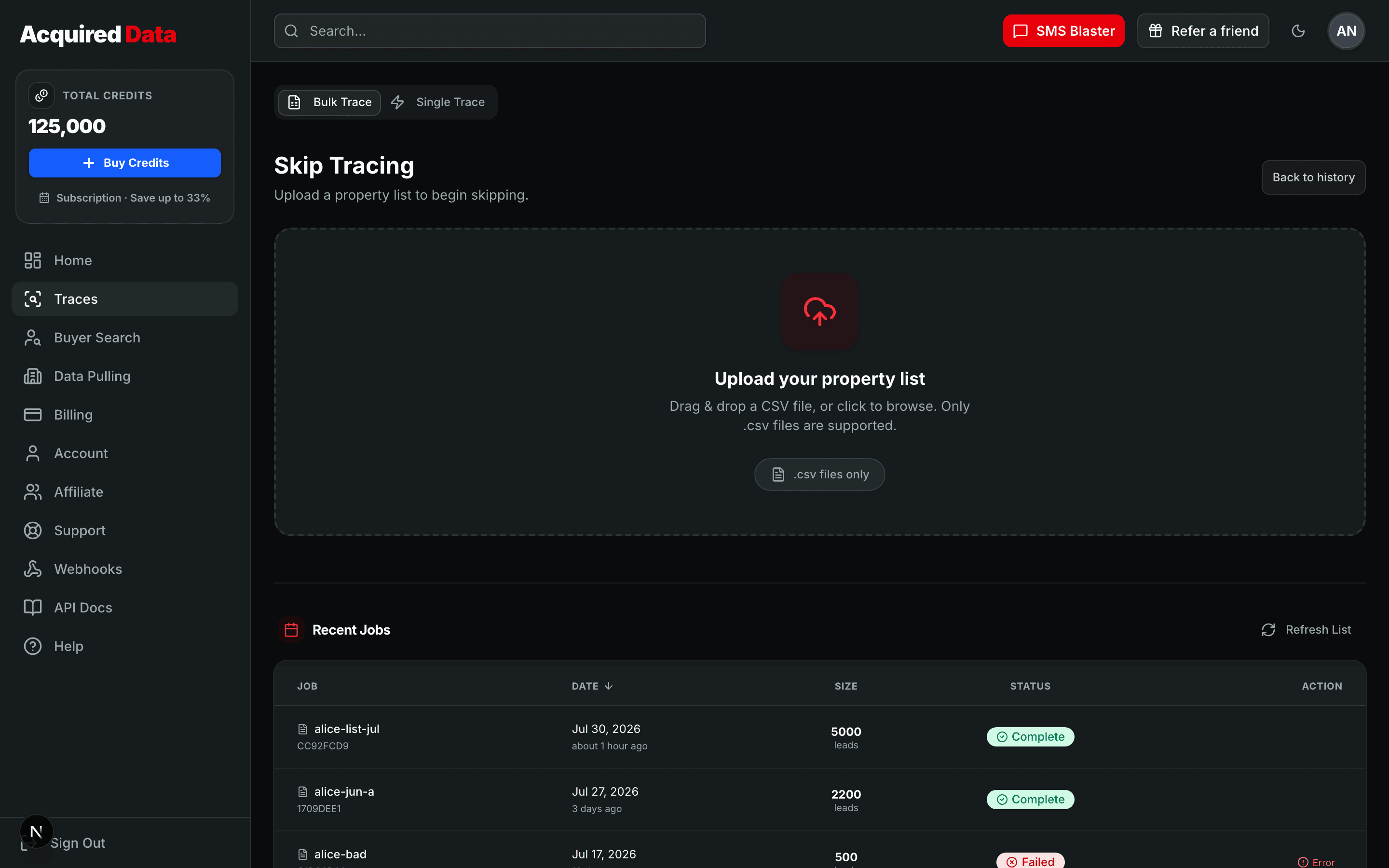 The bulk trace upload zone — a dashed drop area labeled 'Upload your property list' that accepts a dragged-in CSV file, with recent jobs listed below.